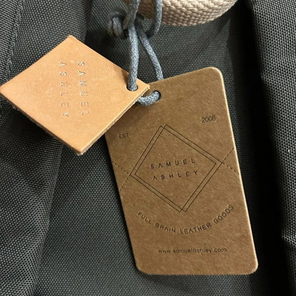 New Laptop Backpack leather trimmed thick canvas water resistance foldable